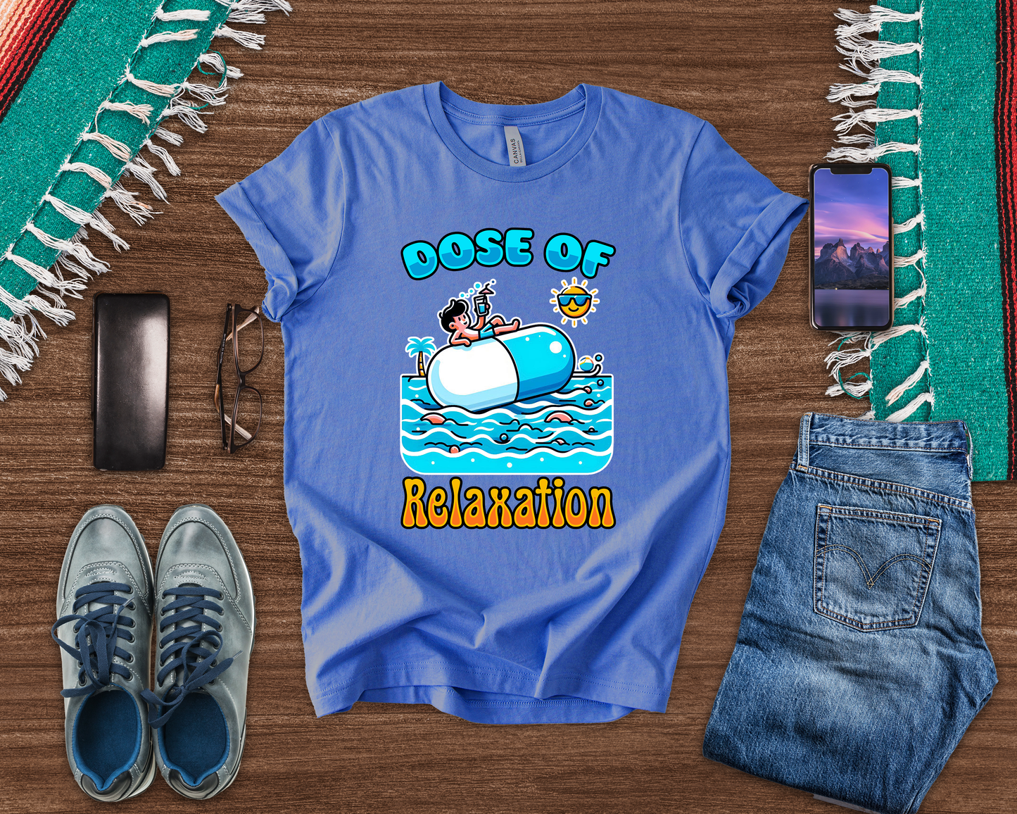 Dose of Relaxation | Boy Sitting on Pill Floating on Water with Drink, Sun & Palm Tree Graphic T-Shirt