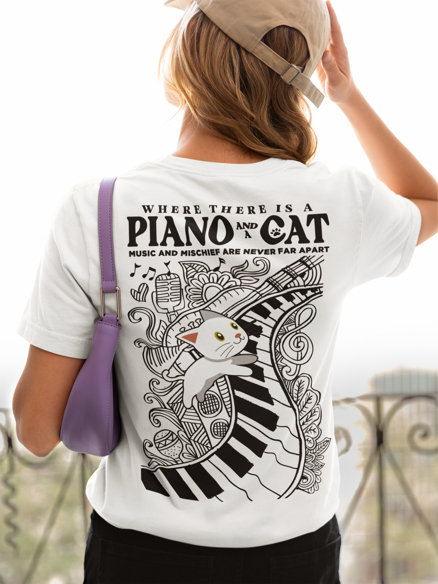 Music and Mischief T-Shirt – Piano and Playful Cat Graphic