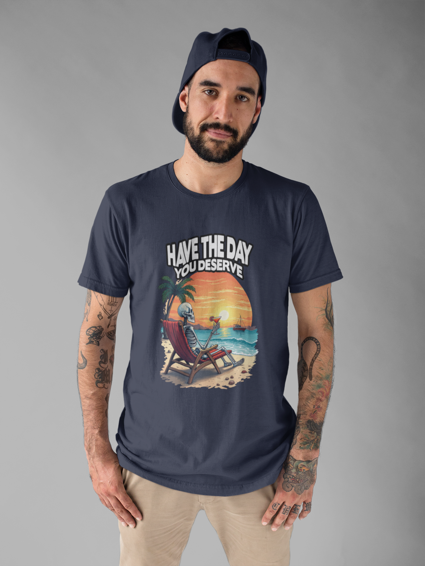 Have the Day You Deserve Tshirt – Relaxing Skeleton with Drink on Beach Sunset