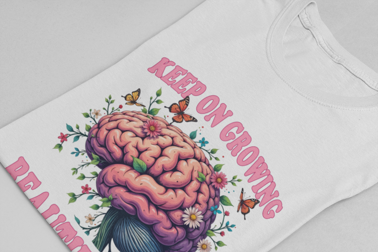 Keep on Growing Beautifully – Brain with Flowers, Plants & Butterflies Graphic T-Shirt