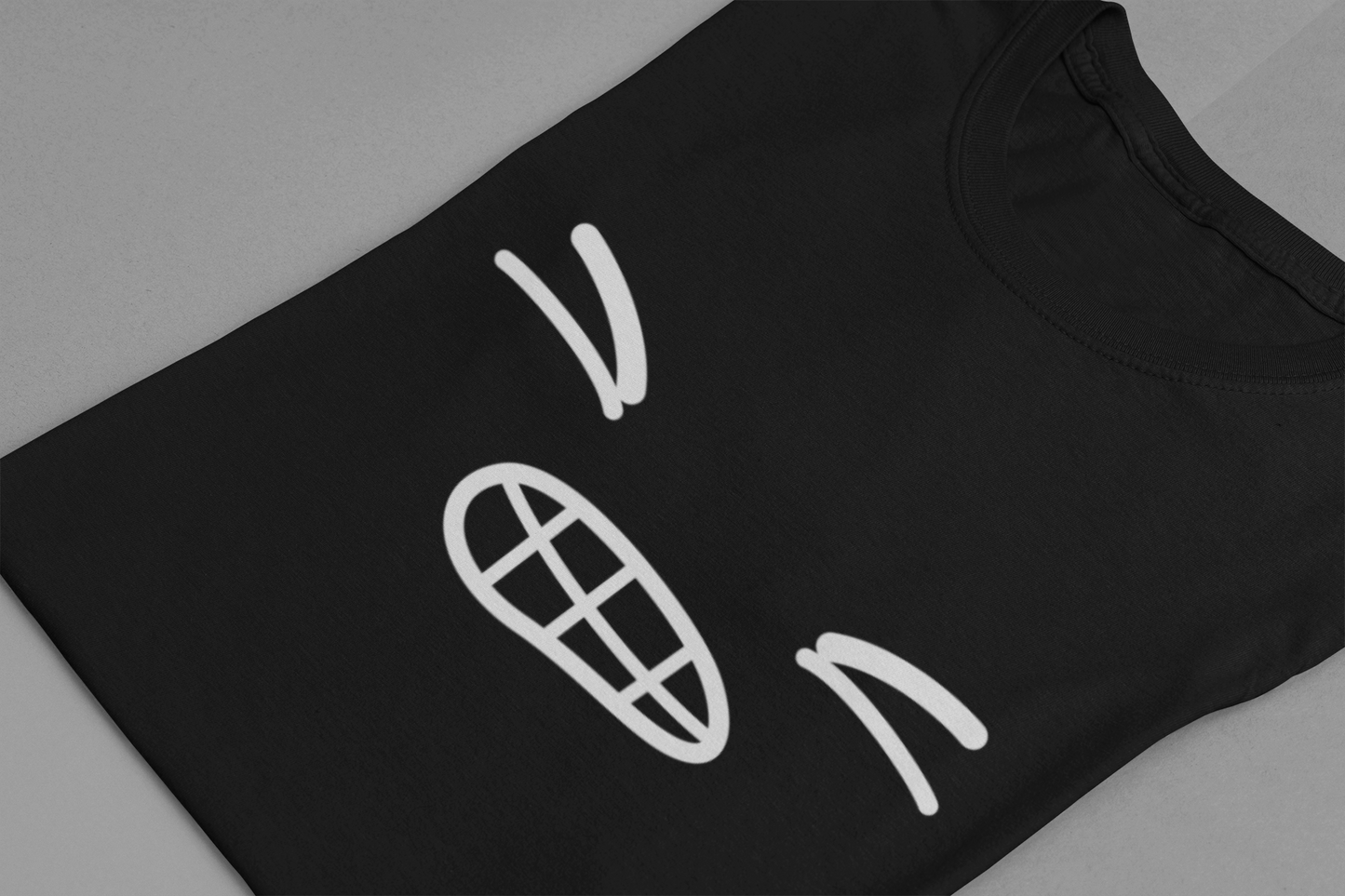 Minimalist Bold Expression T-Shirt – Black Tee with Bold Face Graphic