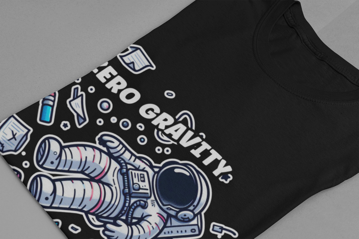 Zero Gravity Problems Astronaut Tshirt – Floating in Space with Everyday Objects