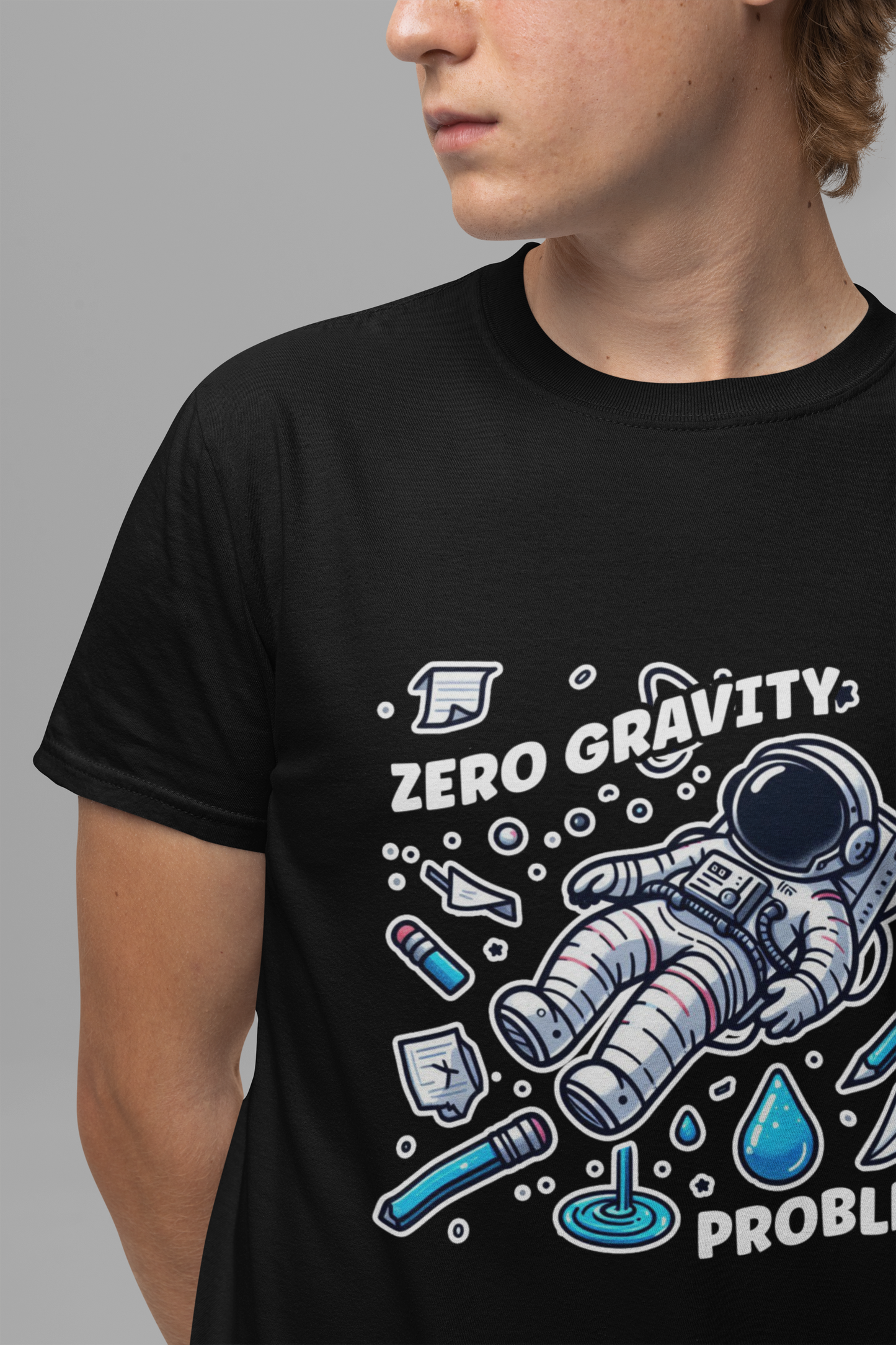 Zero Gravity Problems Astronaut Tshirt – Floating in Space with Everyday Objects