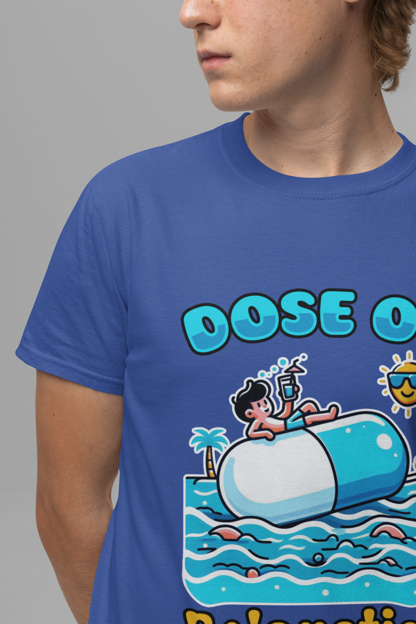 Dose of Relaxation | Boy Sitting on Pill Floating on Water with Drink, Sun & Palm Tree Graphic T-Shirt