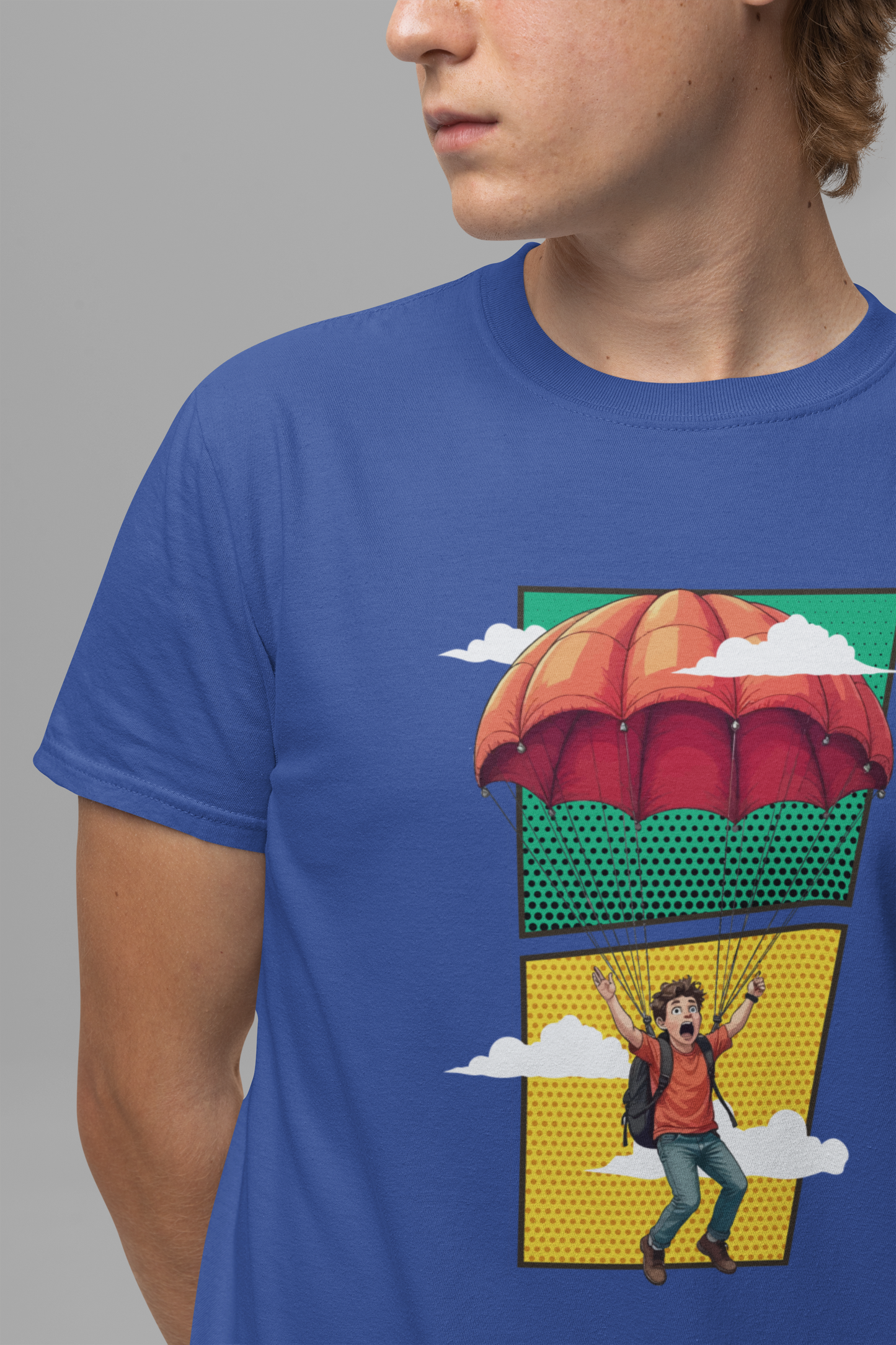Do it Scared Boy Parachuting Mid-Air with Clouds Background Graphic T-Shirt