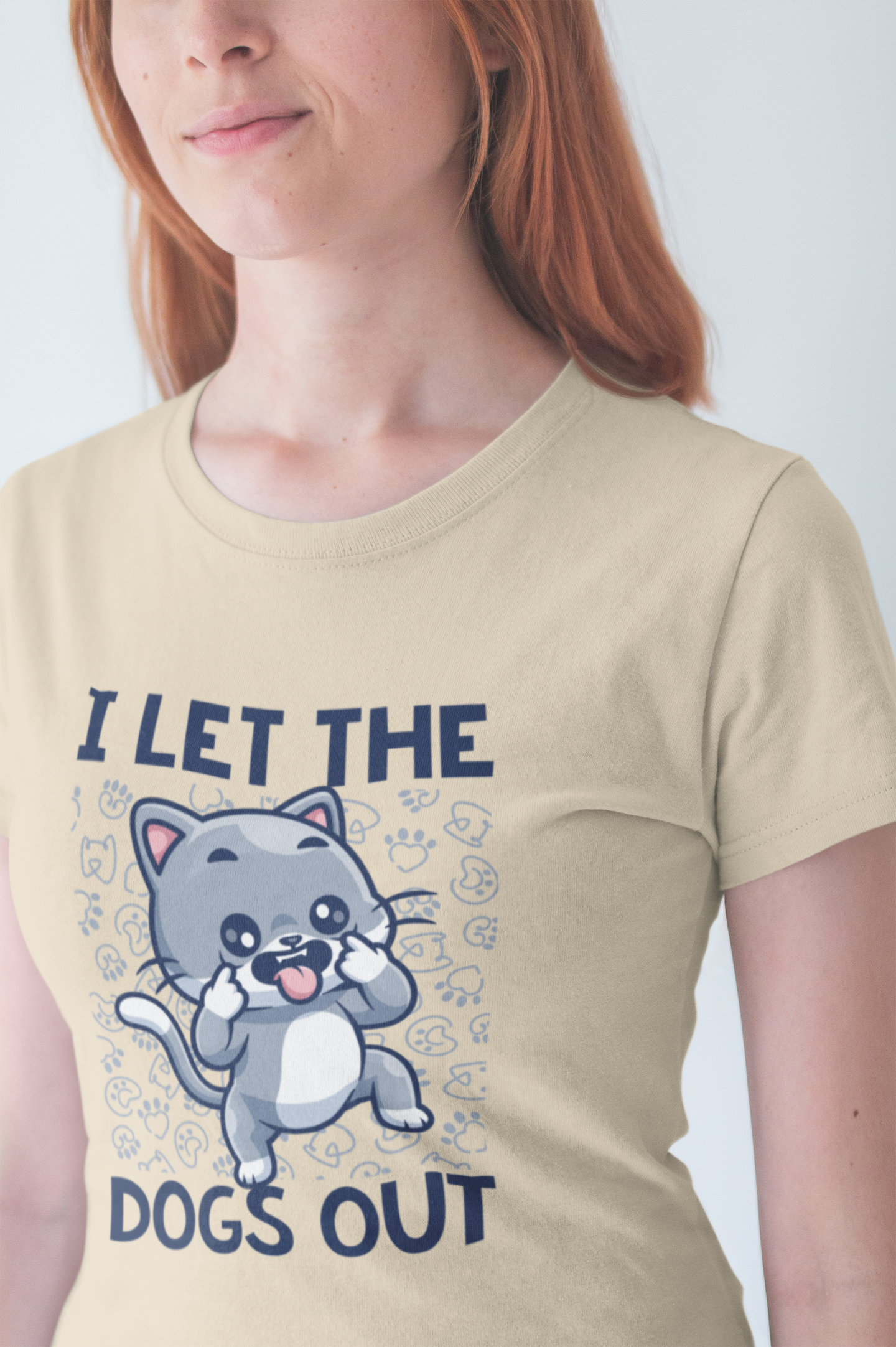 I Let the Dogs Out T-Shirt – Teasing Cat with Paw Prints Graphic Tee