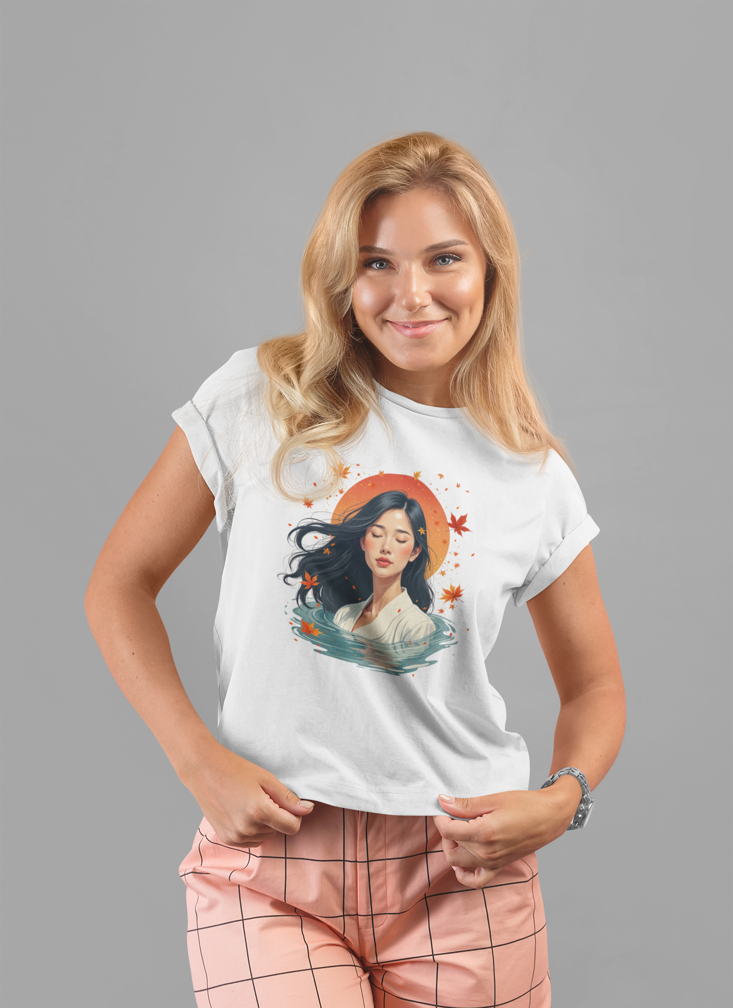Serene Woman in White Dress Chest-Deep in Water with Sunset and Falling Leaves Graphic T-Shirt