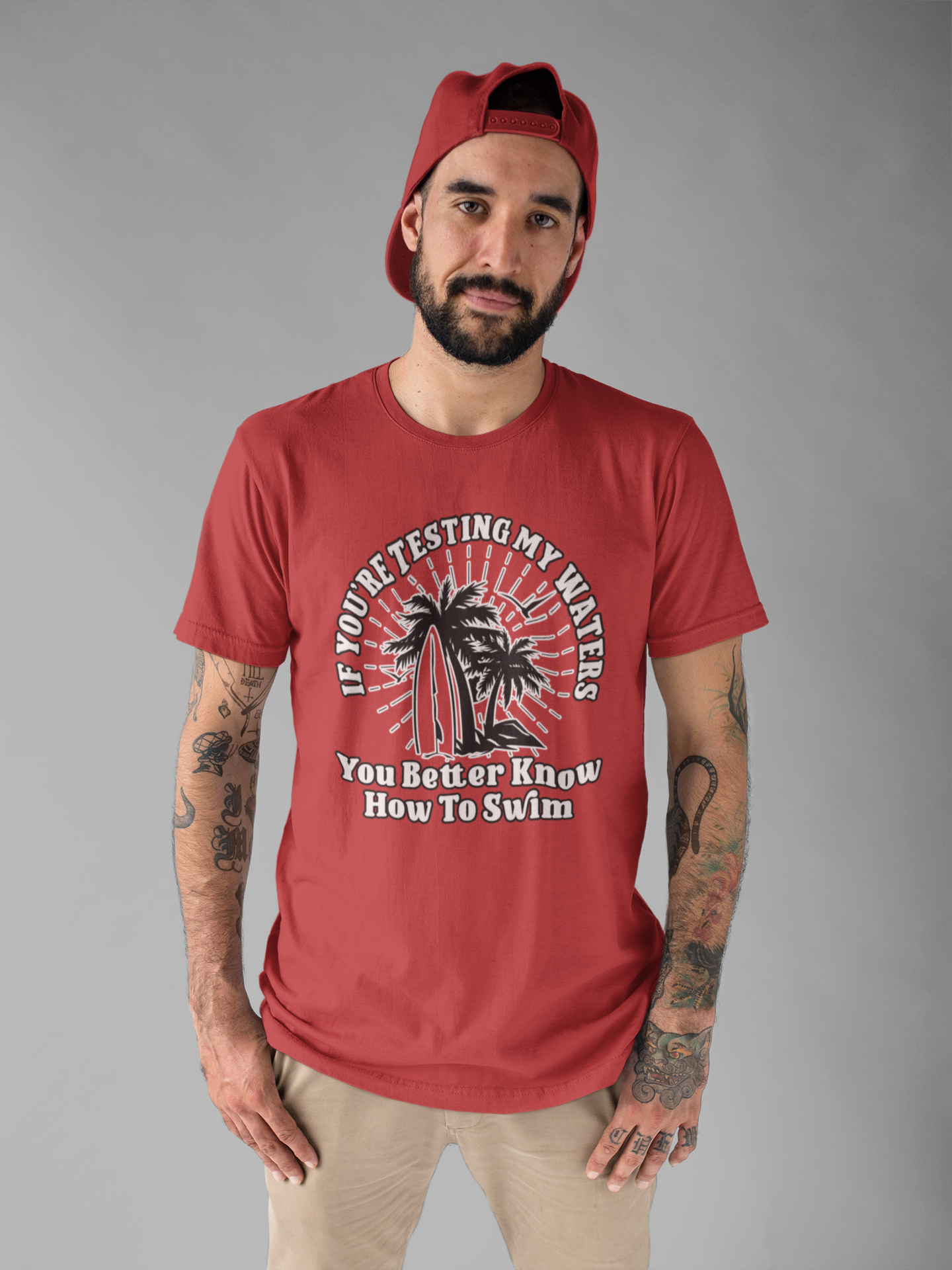 Test My Waters Surf T-Shirt – Beach Palm Trees & Rocks Graphic with Bold Quote