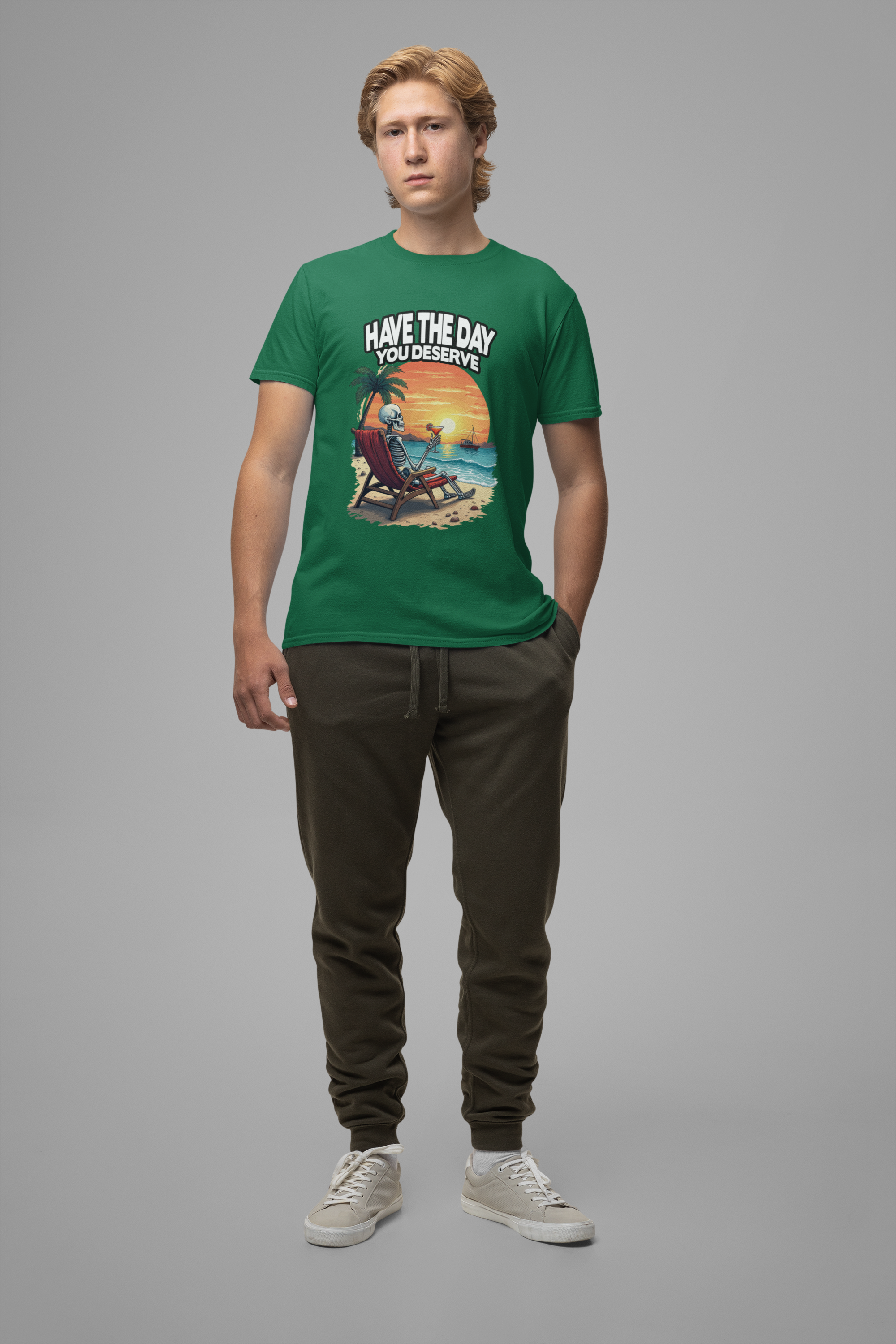 Have the Day You Deserve Tshirt – Relaxing Skeleton with Drink on Beach Sunset