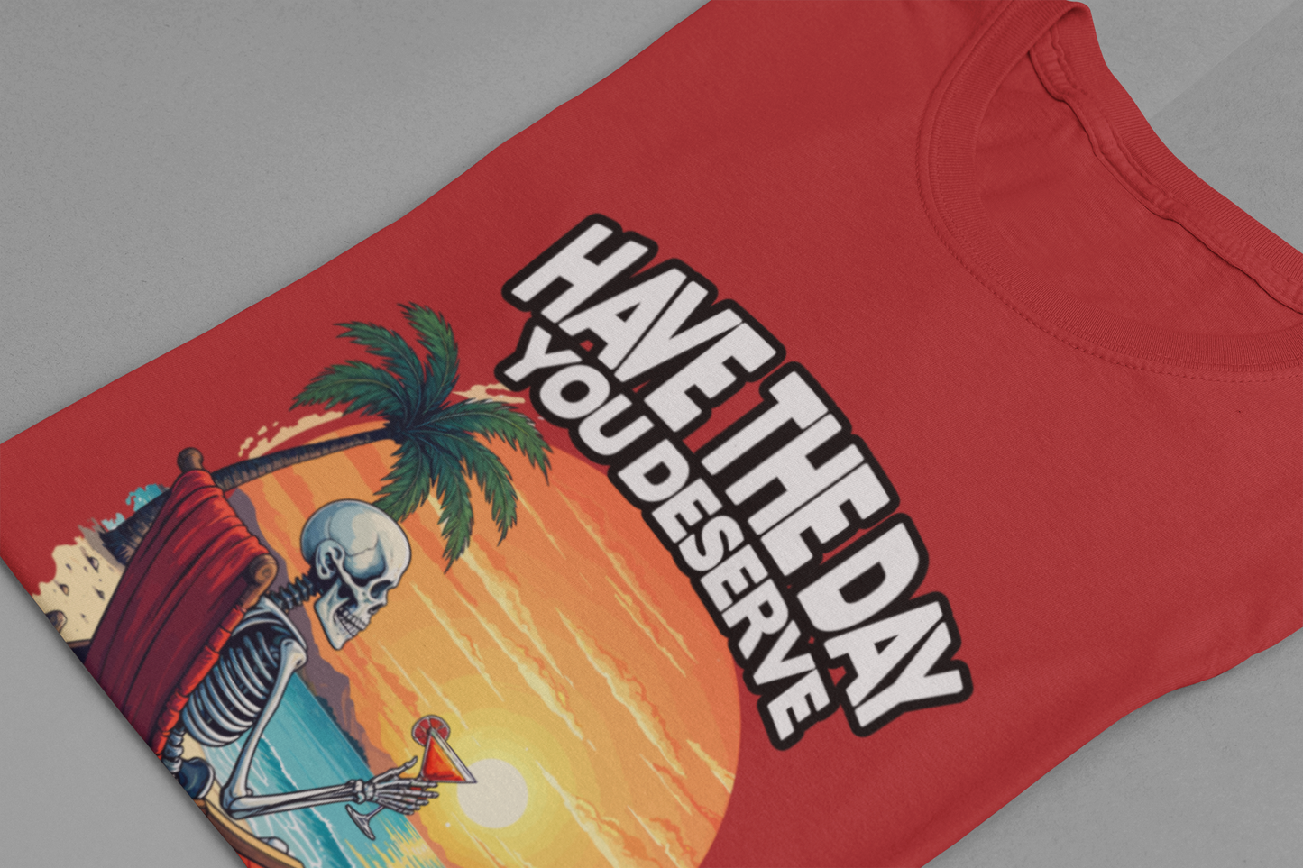 Have the Day You Deserve Tshirt – Relaxing Skeleton with Drink on Beach Sunset