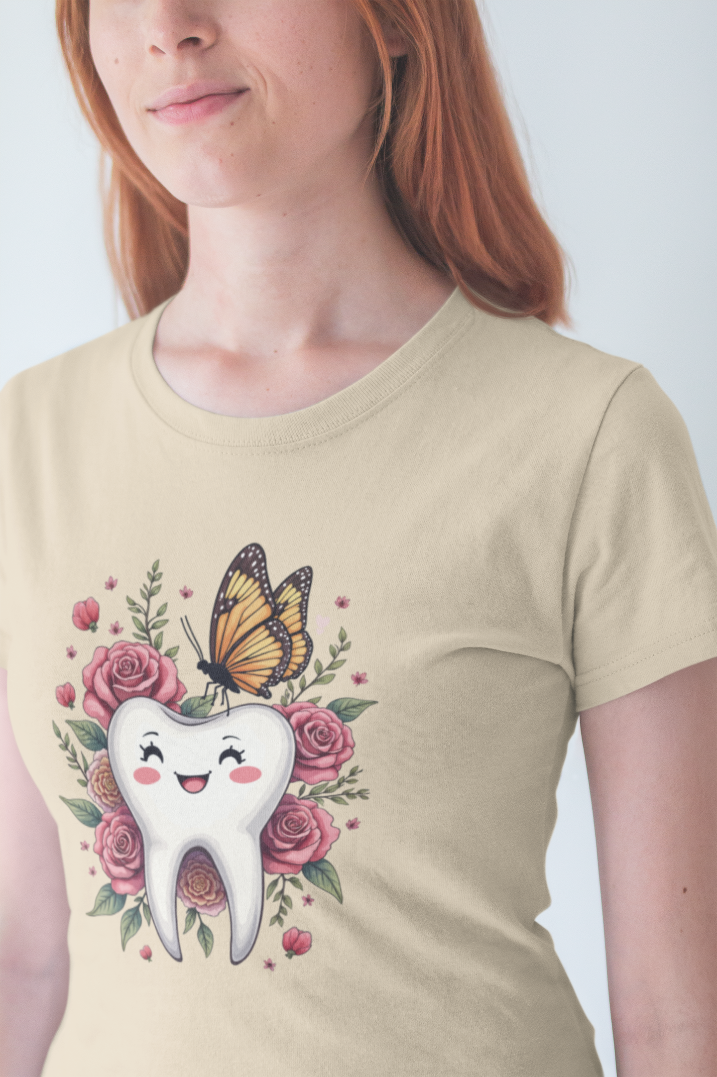 Smile T Shirt Featuring Large Smiling Tooth Surrounded by Flowers Leaves and Butterflies