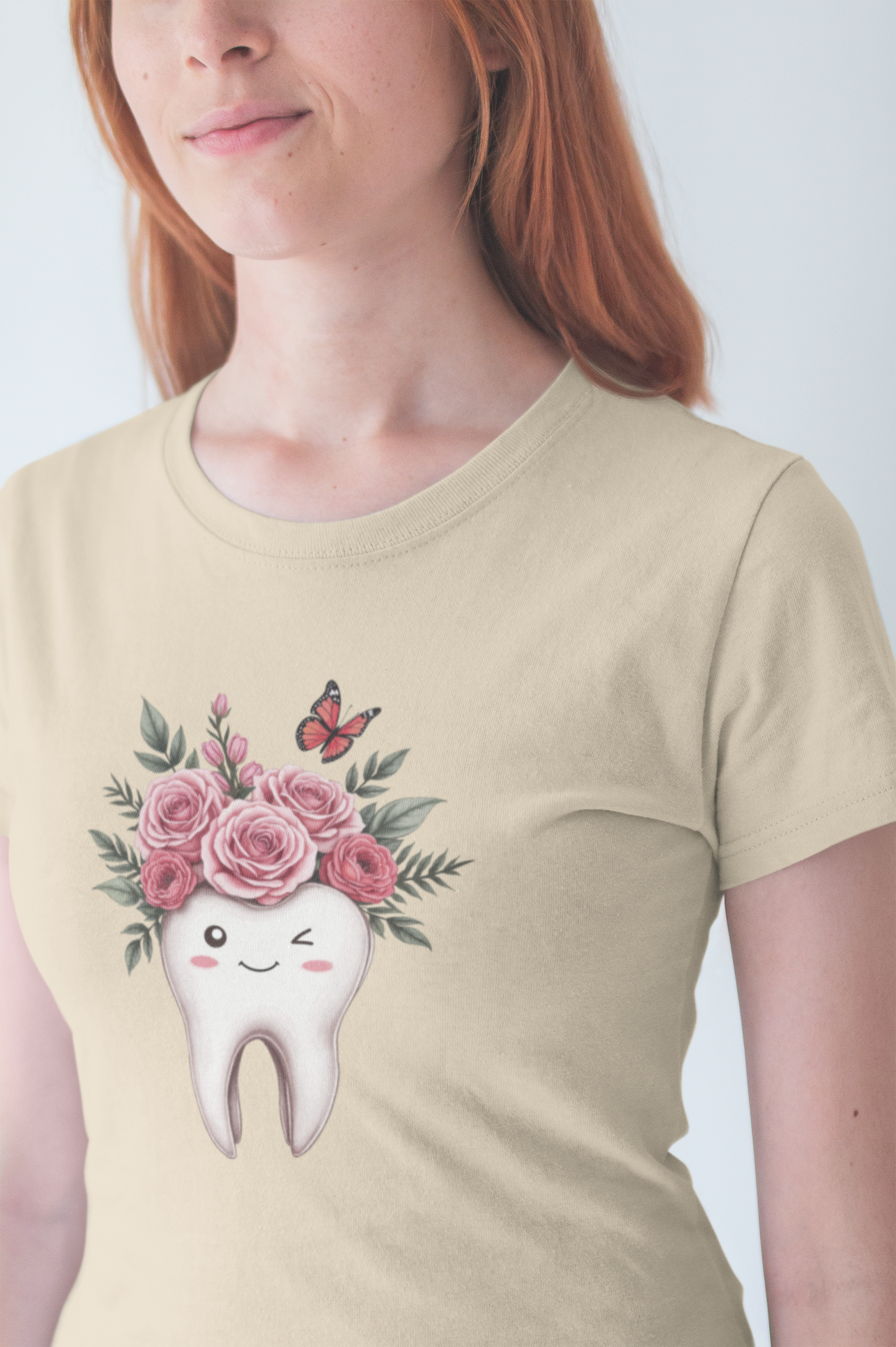 Smile T Shirt with Large Winking Tooth Surrounded by Flowers Leaves and Butterflies
